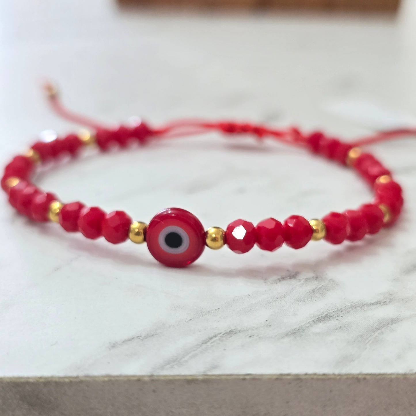 Pulsera ojo rojo de cristal rojo