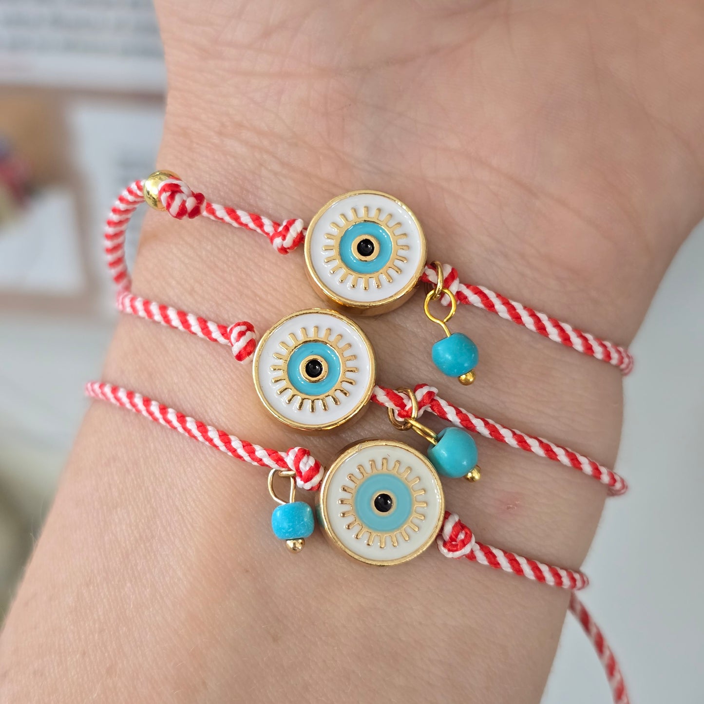 Pulseras de ojito blanco