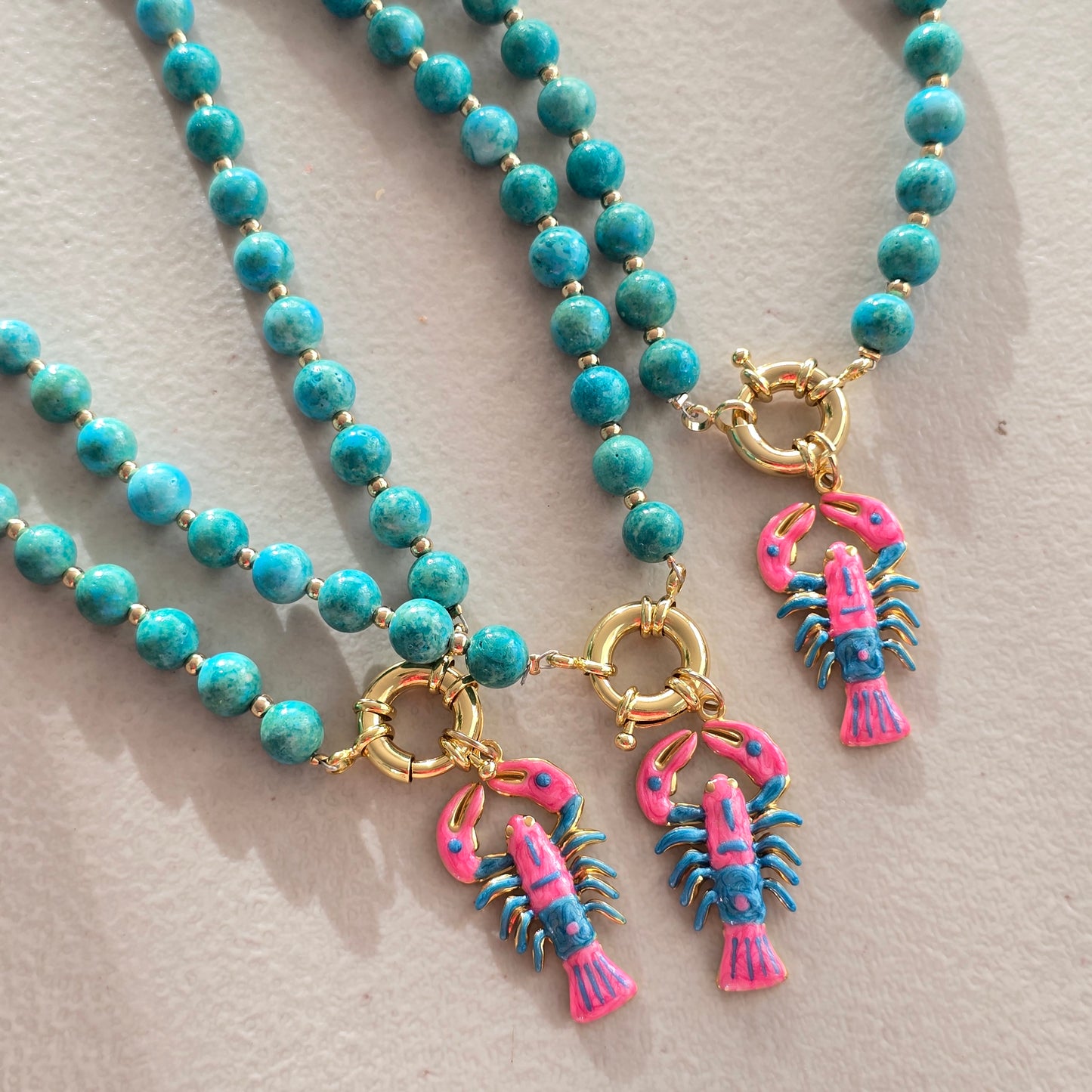 Collar langosta rosa