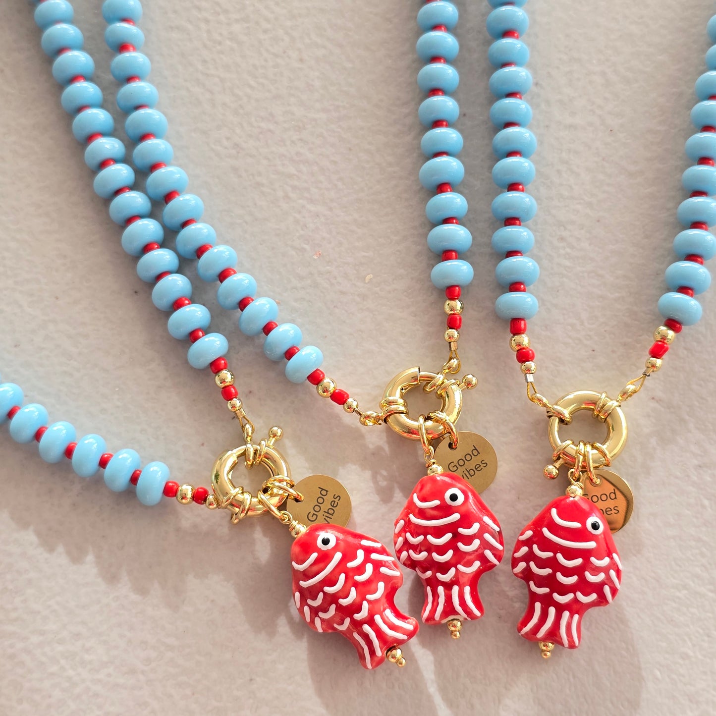 Collar pez gordito rojo