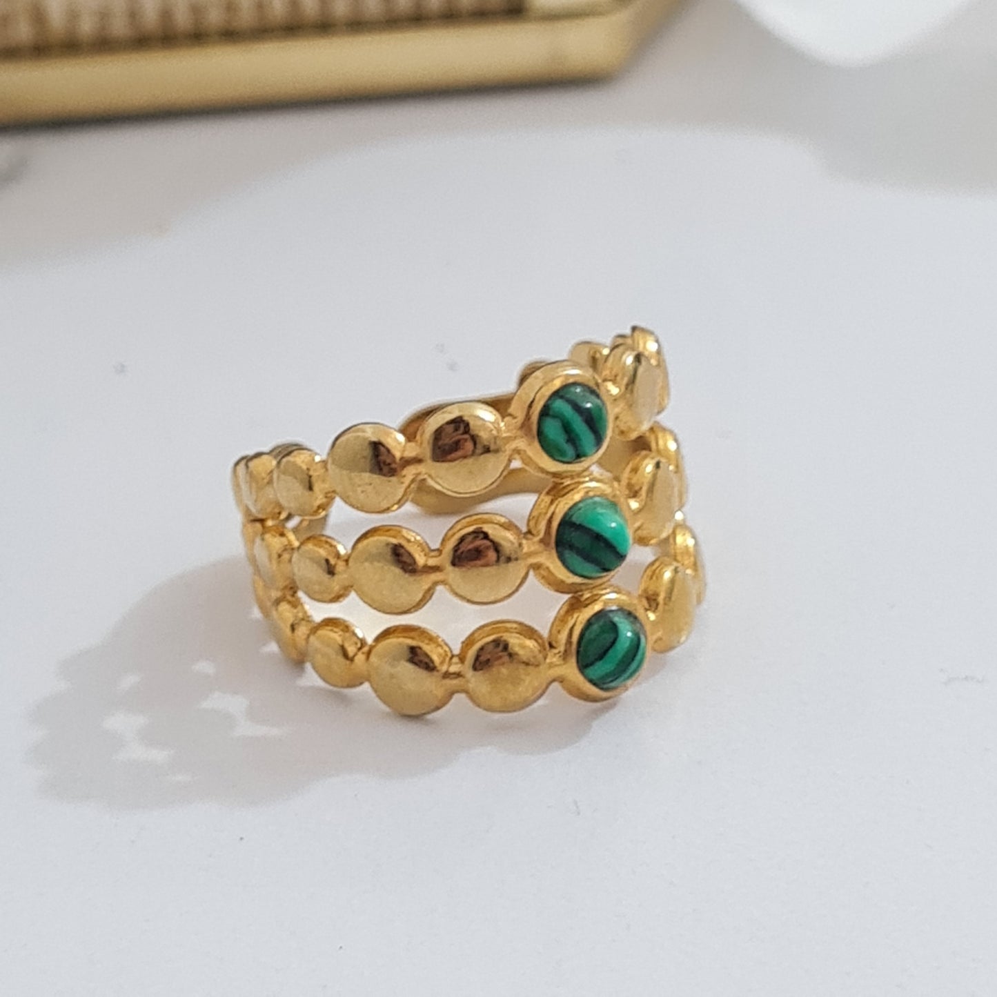 GREEN TRIPLE RING