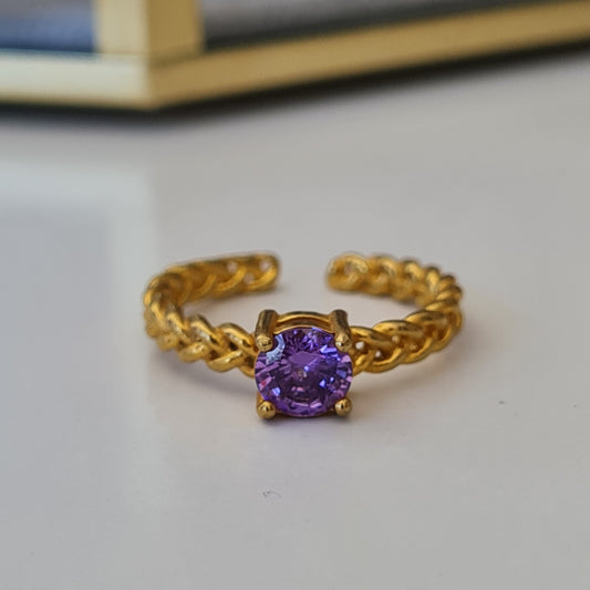 ANILLO TRENZADO ZIRCONIA MORADO