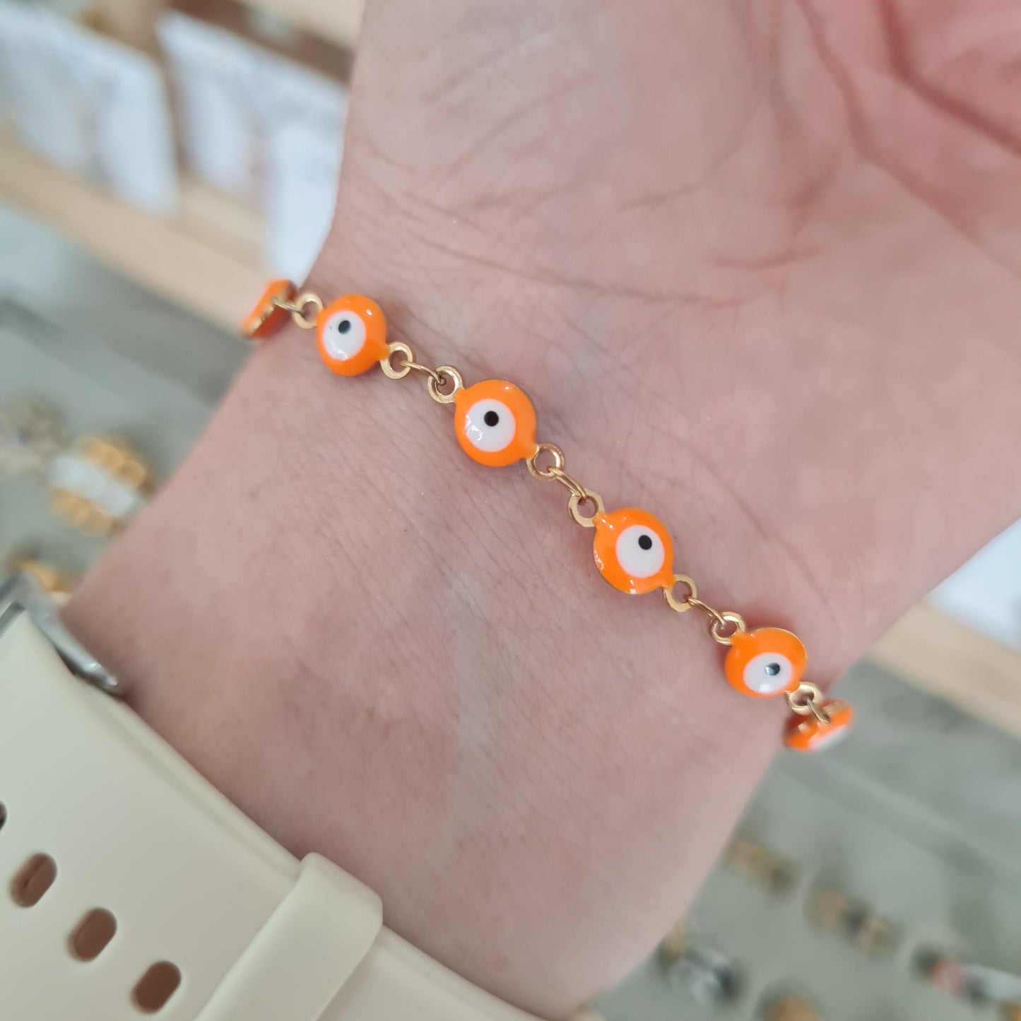 Pulsera multi ojitos naranja