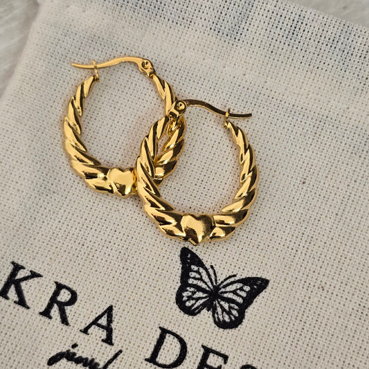 Arracada trenzada de corazon