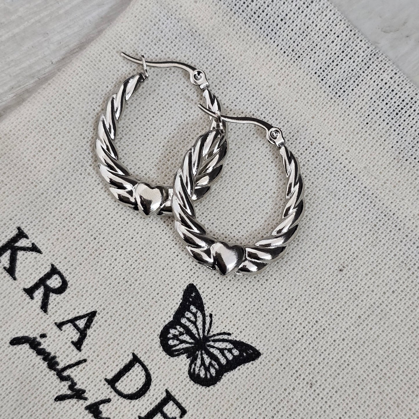 Arracada trenzada corazon