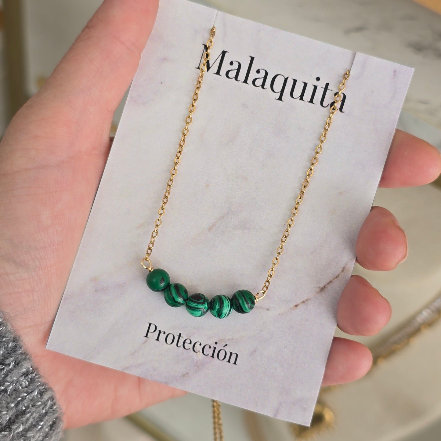 Cadena con intencion de malaquita