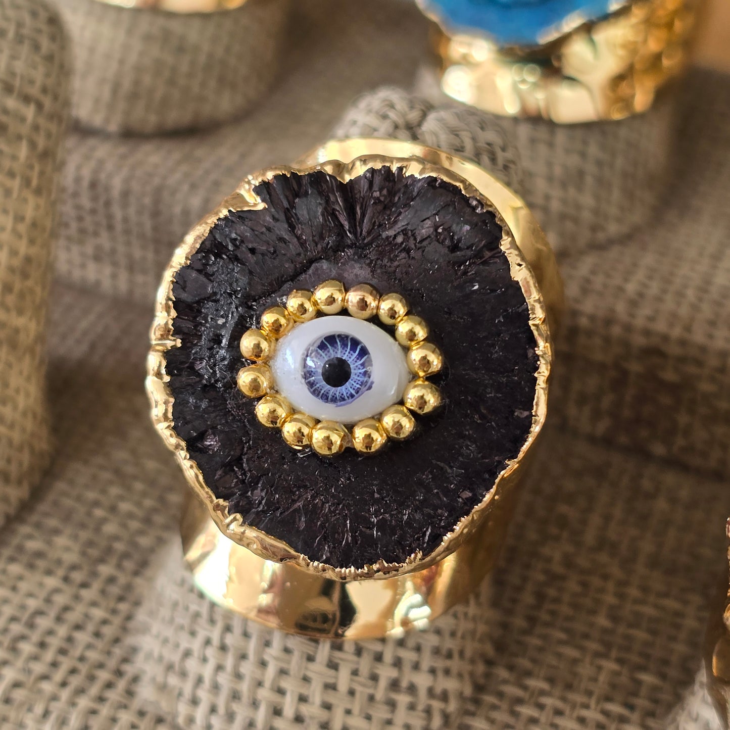 Anillo geoda negra con ojito