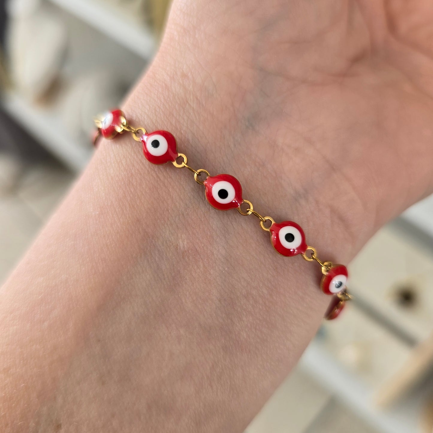 Pulsera de ojitos roja