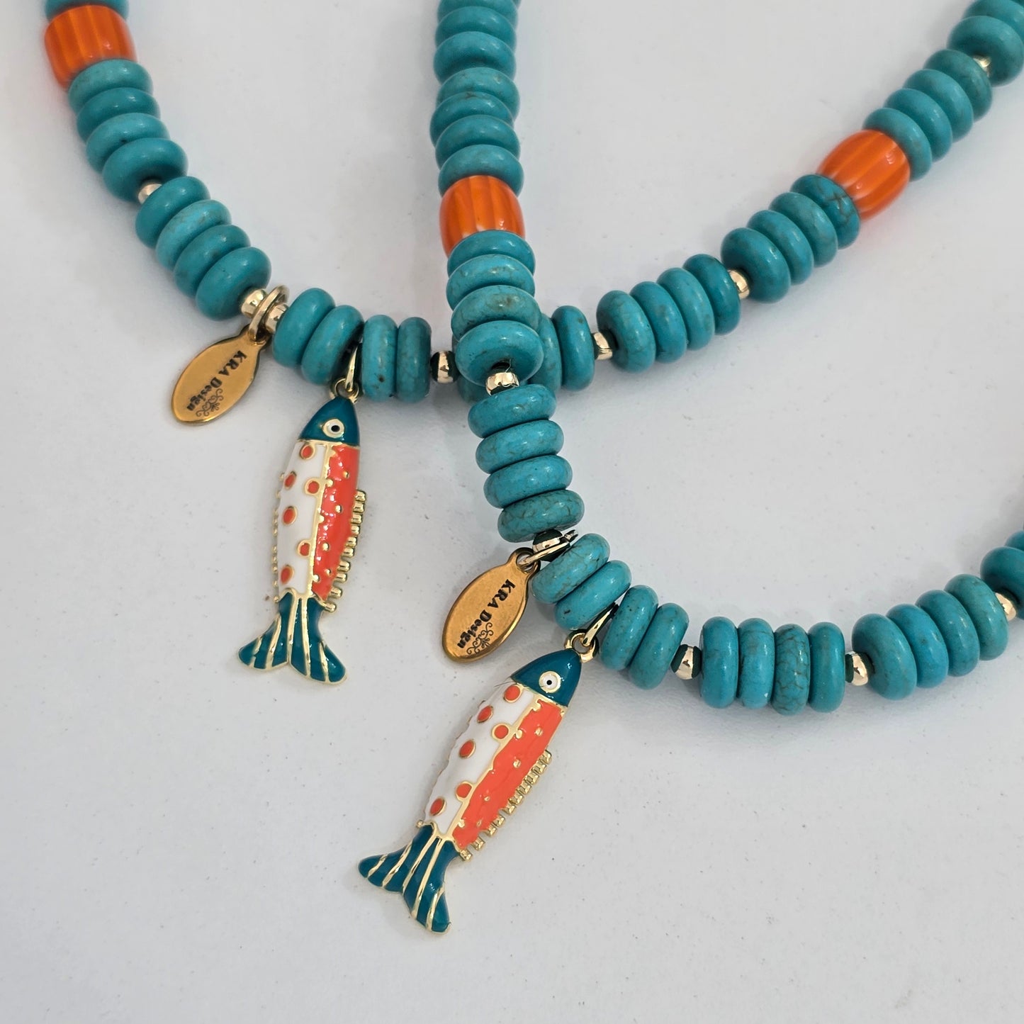 Collar pescado aqua con naranja
