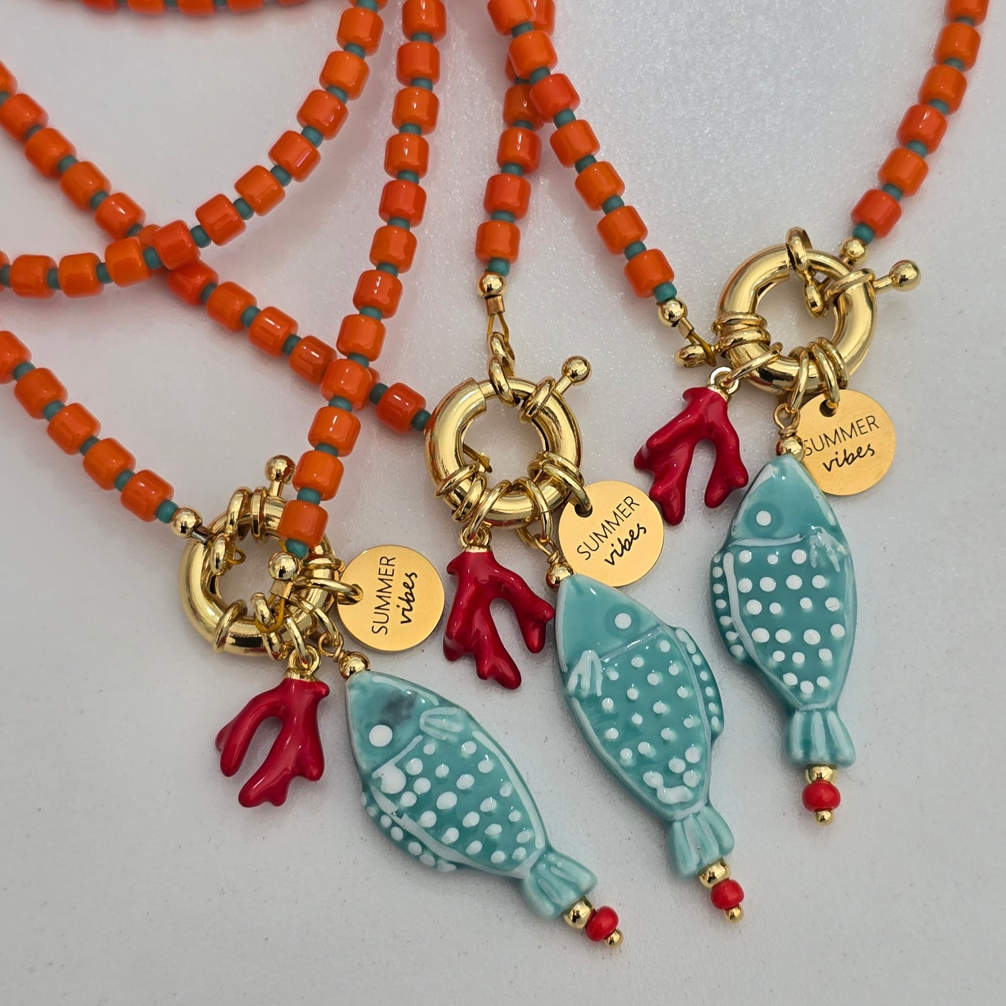 Collar naranja pez celeste